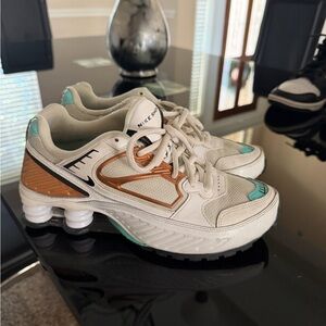 Nike Women's White & Teal Running Shoes with Copper Accents